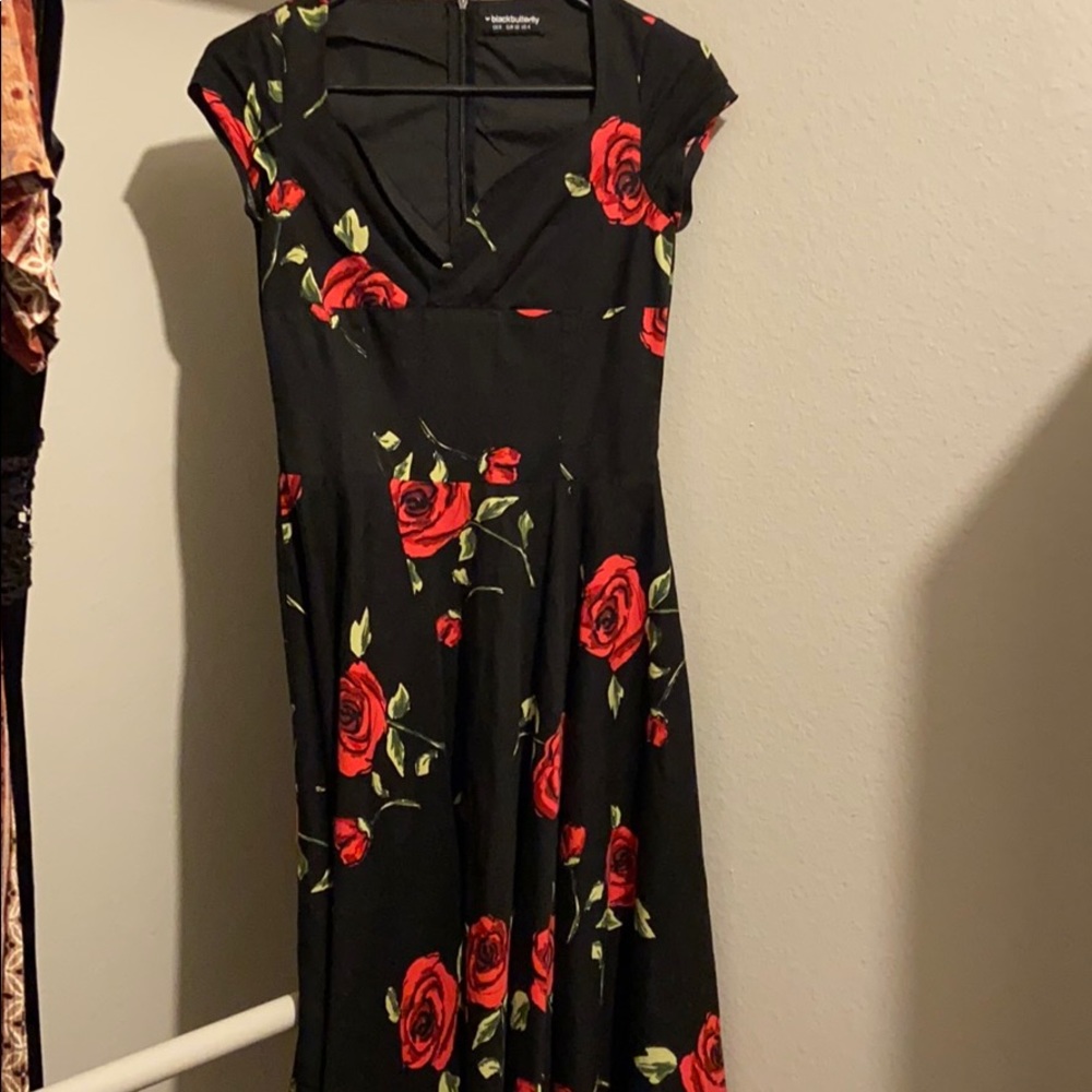 Black dress with red roses. Very vintage style.
